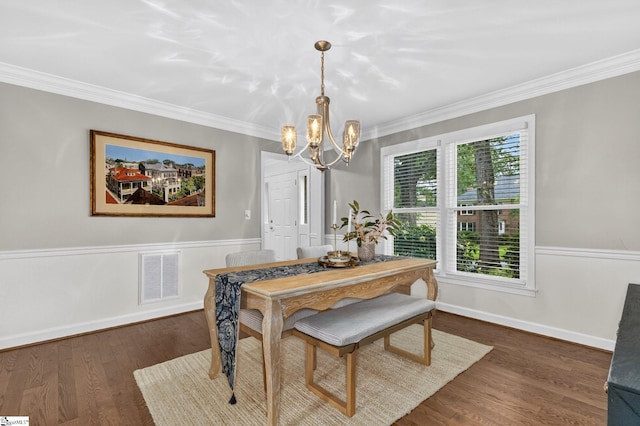 103 W Shallowstone Rd, Greer, SC 29650 - dining space featuring a chandelier, ornamental molding, and wood finished floors