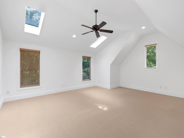 1 Touch Me Not Trl, Landrum, SC 29356 - bonus room featuring a skylight, lofted ceiling, recessed lighting, light colored carpet, and ceiling fan