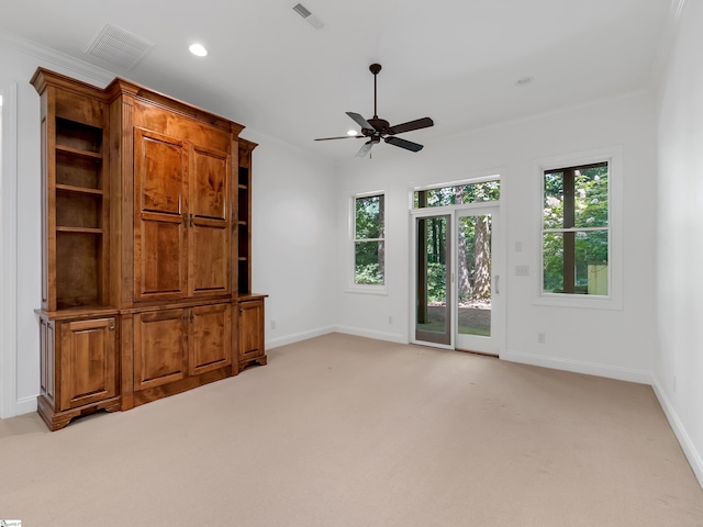 1 Touch Me Not Trl, Landrum, SC 29356 - unfurnished living room featuring ceiling fan, light colored carpet, recessed lighting, and crown molding