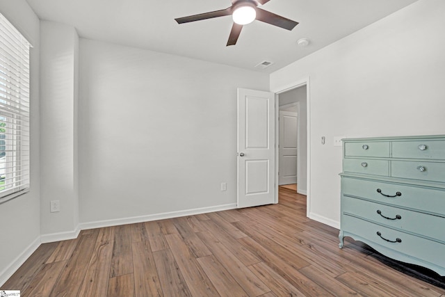 353 Anna Gray Cir, Easley, SC 29640 - unfurnished bedroom featuring wood finished floors and ceiling fan