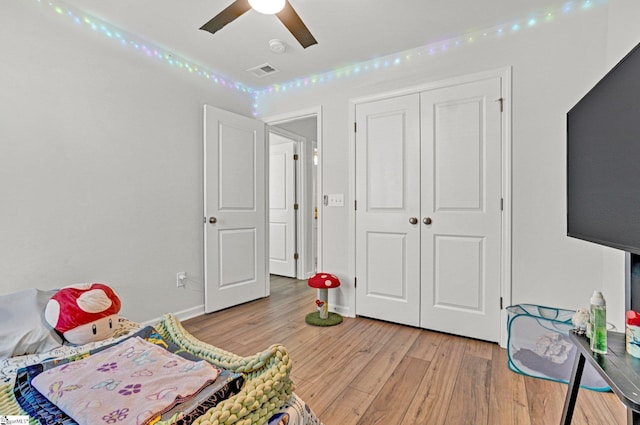 353 Anna Gray Cir, Easley, SC 29640 - bedroom with light wood-style floors, a ceiling fan, and a closet