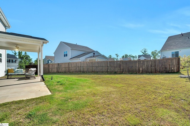 353 Anna Gray Cir, Easley, SC 29640 - fenced backyard with a patio area, a ceiling fan, and an outdoor hangout area
