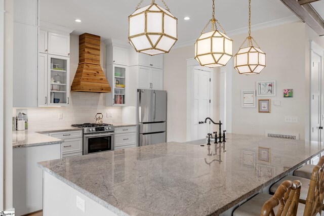 352 Pine Forest Drive Extension, Greenville, SC 29605 - kitchen with stainless steel appliances, premium range hood, a kitchen breakfast bar, white cabinets, and recessed lighting