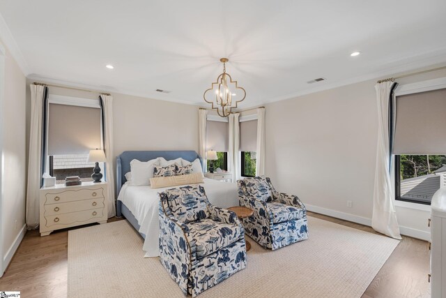 352 Pine Forest Drive Extension, Greenville, SC 29605 - bedroom featuring light wood finished floors, a chandelier, crown molding, and recessed lighting