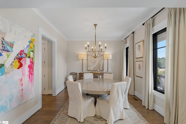352 Pine Forest Drive Extension, Greenville, SC 29605 - dining area featuring a chandelier, wood finished floors, and ornamental molding