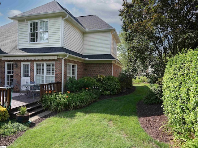 4 Glens Crossing Ct, Greer, SC 29650 - view of side of property featuring a lawn, brick siding, a wooden deck, and roof with shingles