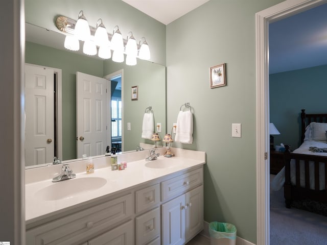 4 Glens Crossing Ct, Greer, SC 29650 - ensuite bathroom featuring double vanity and baseboards