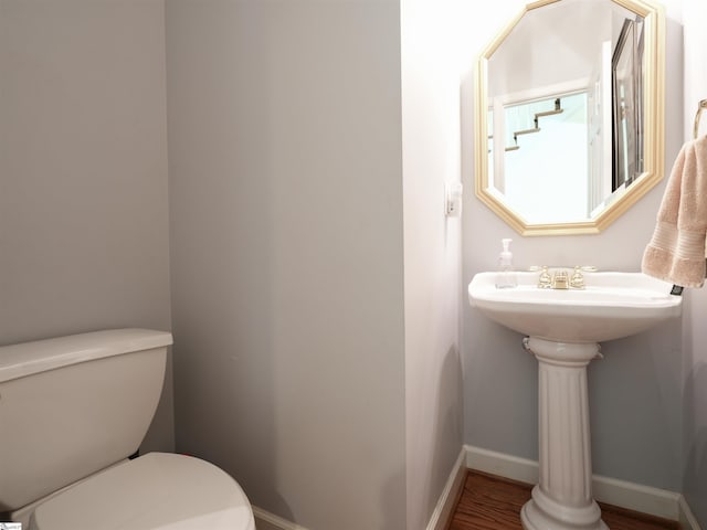 4 Glens Crossing Ct, Greer, SC 29650 - bathroom with toilet and wood finished floors