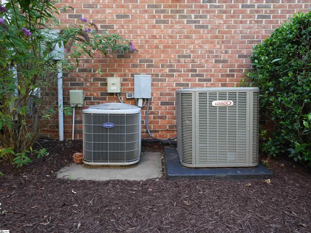 4 Glens Crossing Ct, Greer, SC 29650 - exterior view of a cooling unit and brick siding