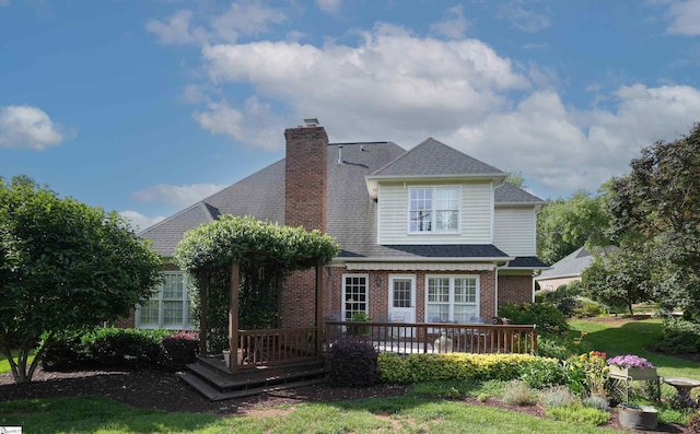 4 Glens Crossing Ct, Greer, SC 29650 - rear view of property with brick siding, a chimney, roof with shingles, a yard, and a deck