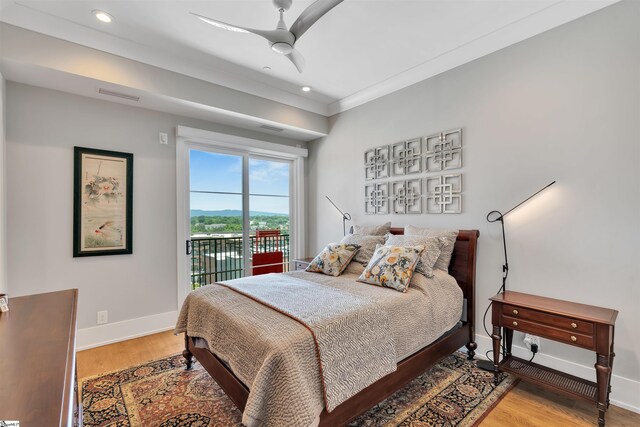 110 N Markley St Unit 505, Greenville, SC 29601 - bedroom with access to outside, recessed lighting, light wood-style flooring, and a ceiling fan
