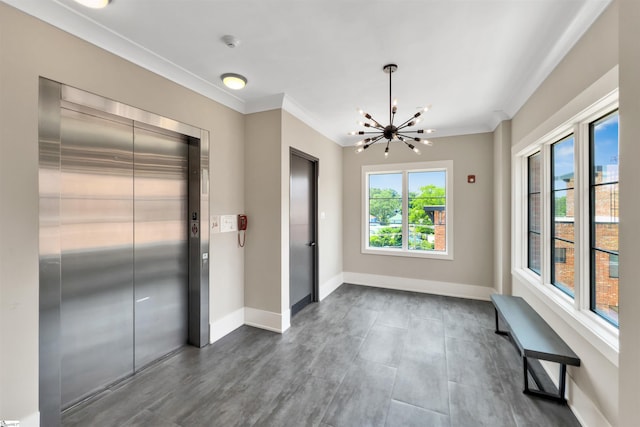 110 N Markley St Unit 505, Greenville, SC 29601 - unfurnished dining area with elevator, a chandelier, and ornamental molding