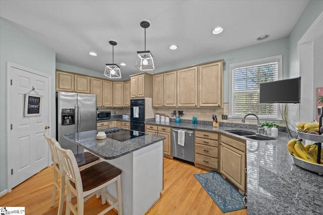 2 Willow Oak Ct, Simpsonville, SC 29681 - kitchen featuring black appliances, light brown cabinetry, decorative backsplash, dark stone countertops, and light wood-style floors