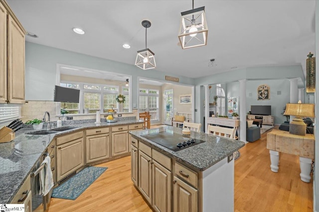 2 Willow Oak Ct, Simpsonville, SC 29681 - kitchen featuring black electric stovetop, light brown cabinets, light wood-style floors, ornate columns, and dark stone countertops