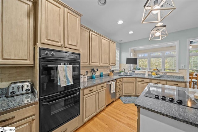 2 Willow Oak Ct, Simpsonville, SC 29681 - kitchen featuring black appliances, light brown cabinetry, tasteful backsplash, dark stone counters, and recessed lighting