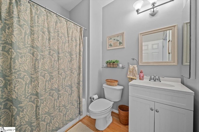 2 Willow Oak Ct, Simpsonville, SC 29681 - bathroom featuring vanity, wood finished floors, and shower / bathtub combination with curtain