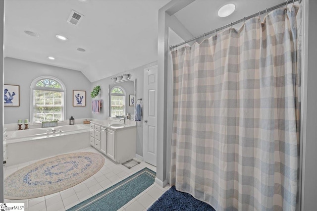 2 Willow Oak Ct, Simpsonville, SC 29681 - bathroom with a bath, vanity, tile patterned flooring, vaulted ceiling, and recessed lighting