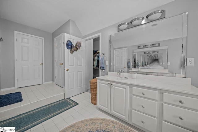 2 Willow Oak Ct, Simpsonville, SC 29681 - bathroom with tile patterned flooring, vanity, and a walk in closet