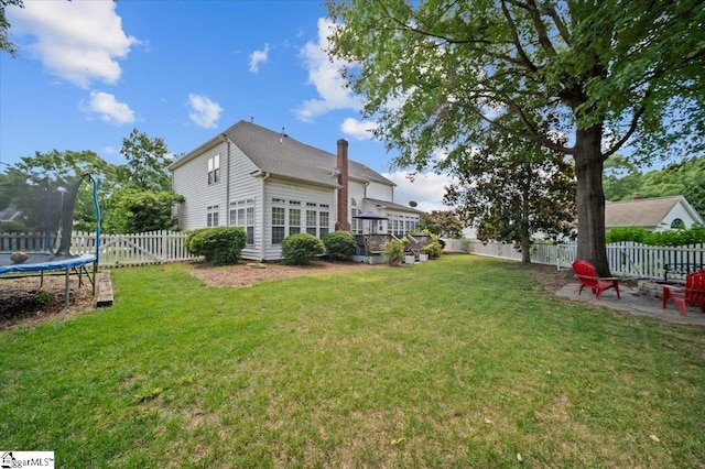 2 Willow Oak Ct, Simpsonville, SC 29681 - fenced backyard with a trampoline and a patio