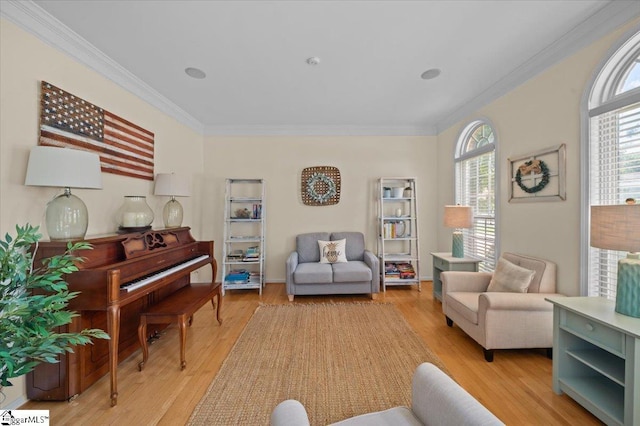 2 Willow Oak Ct, Simpsonville, SC 29681 - living room featuring crown molding, healthy amount of natural light, and light wood-type flooring