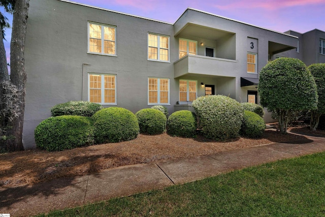601 Cleveland St Unit 3A, Greenville, SC 29601 - view of front of house with stucco siding and a balcony