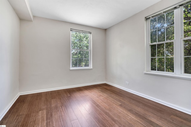 601 Cleveland St Unit 3A, Greenville, SC 29601 - empty room with baseboards and dark wood-style floors