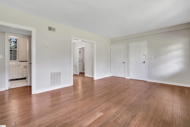 601 Cleveland St Unit 3A, Greenville, SC 29601 - unfurnished living room with wood finished floors