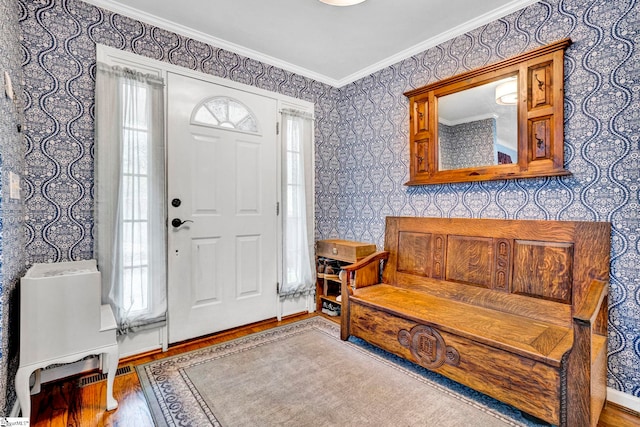 105 Devonshire Ln, Greenville, SC 29617 - entryway with wood finished floors, wallpapered walls, crown molding, and healthy amount of natural light
