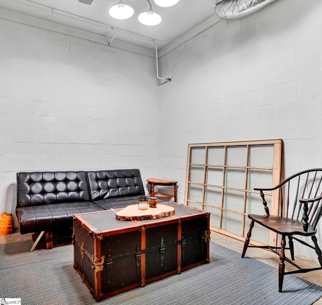 105 Devonshire Ln, Greenville, SC 29617 - living room featuring carpet and concrete block wall