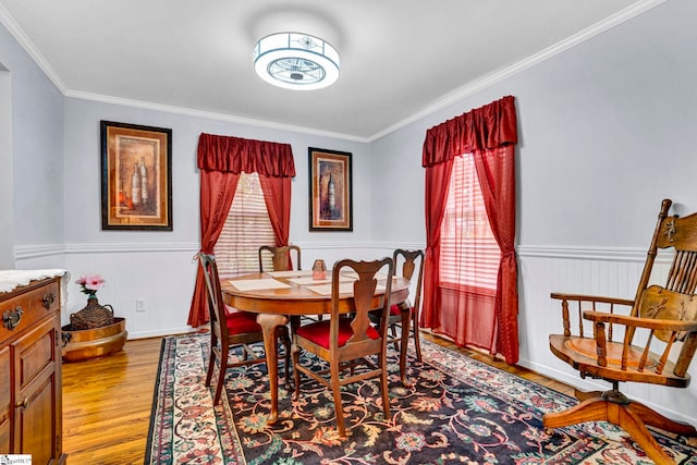 105 Devonshire Ln, Greenville, SC 29617 - dining area featuring wood finished floors, ornamental molding, and a wainscoted wall