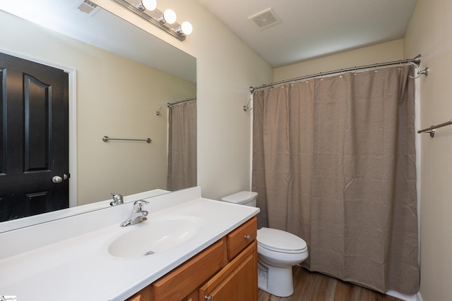 6 Gratiot Ln, Greer, SC 29651 - full bathroom with wood finished floors, vanity, and a shower with curtain