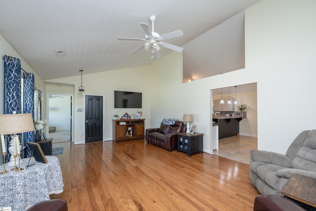 6 Gratiot Ln, Greer, SC 29651 - living room with wood finished floors, ceiling fan, and high vaulted ceiling