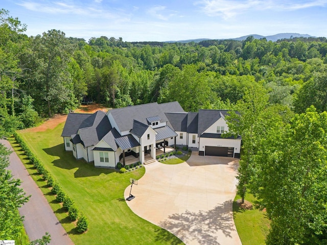 421 Lynn Rd, Taylors, SC 29687 - view of subject property featuring a heavily wooded area