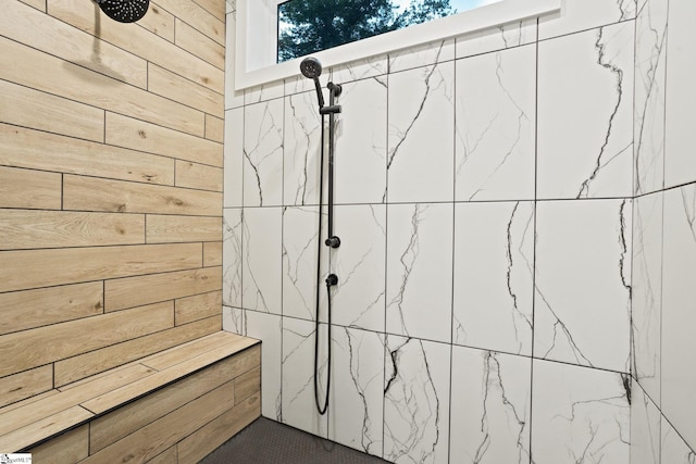 421 Lynn Rd, Taylors, SC 29687 - full bathroom featuring tiled shower and wood walls