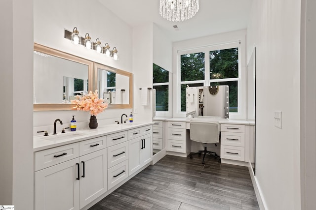 421 Lynn Rd, Taylors, SC 29687 - bathroom with double vanity, a chandelier, and wood finished floors
