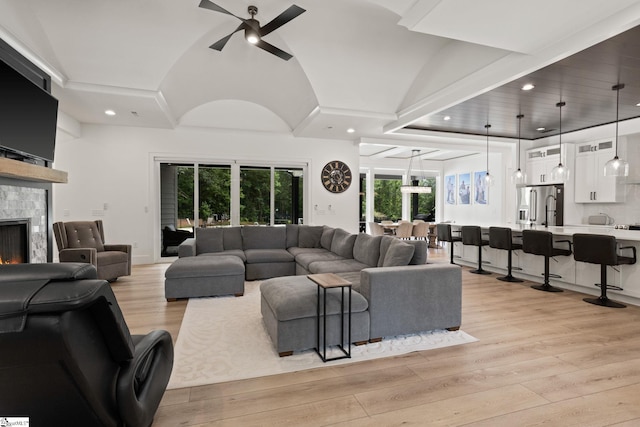 421 Lynn Rd, Taylors, SC 29687 - living area featuring ceiling fan, recessed lighting, light wood finished floors, and a warm lit fireplace