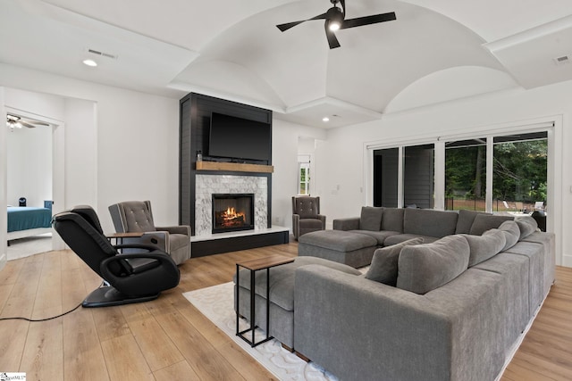 421 Lynn Rd, Taylors, SC 29687 - living room with ceiling fan, hardwood / wood-style floors, a stone fireplace, vaulted ceiling, and recessed lighting