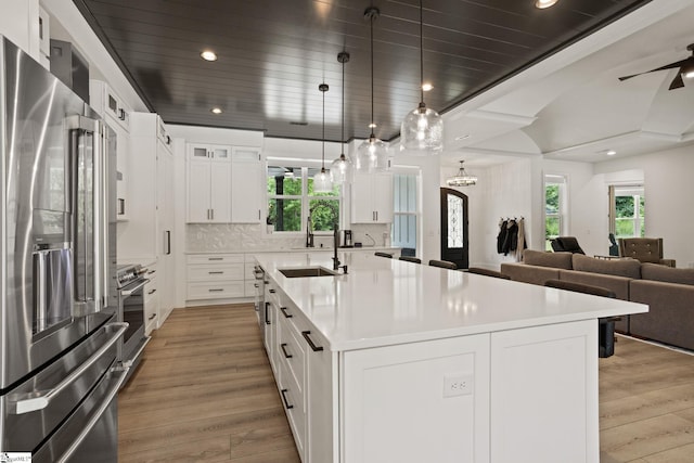 421 Lynn Rd, Taylors, SC 29687 - kitchen with high end refrigerator, light wood-type flooring, recessed lighting, open floor plan, and a kitchen island with sink