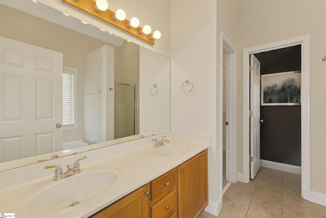 10 Parkcrest Ct, Simpsonville, SC 29681 - full bathroom featuring a garden tub, tile patterned flooring, double vanity, and a shower with door