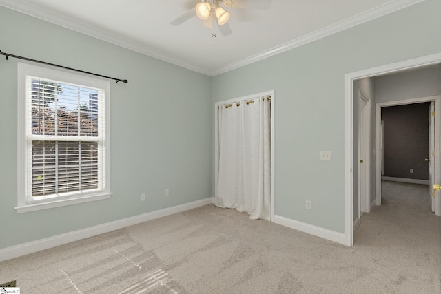 10 Parkcrest Ct, Simpsonville, SC 29681 - unfurnished bedroom featuring carpet, ornamental molding, a closet, and a ceiling fan