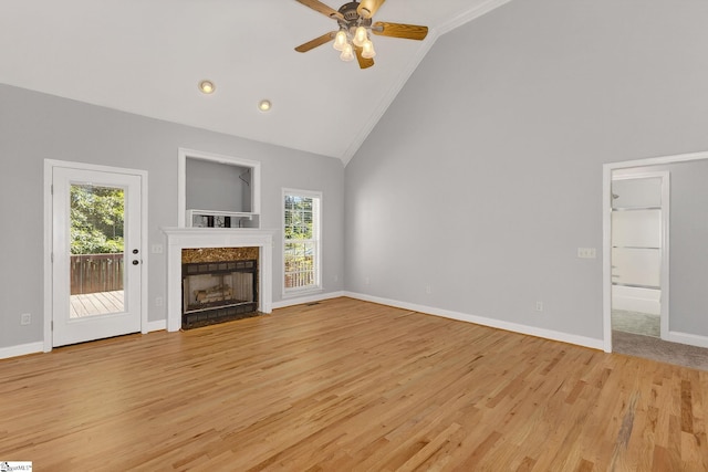 10 Parkcrest Ct, Simpsonville, SC 29681 - unfurnished living room featuring high vaulted ceiling, plenty of natural light, a premium fireplace, light wood-style floors, and ceiling fan
