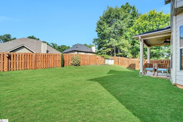 112 Cameron Creek Ln, Simpsonville, SC 29681 - fenced backyard with ceiling fan and a patio