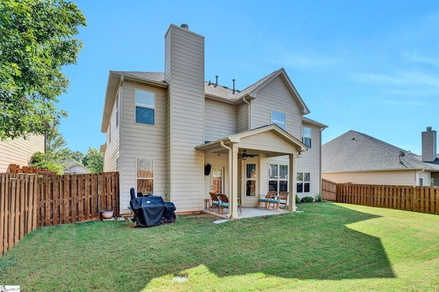 112 Cameron Creek Ln, Simpsonville, SC 29681 - rear view of property featuring a patio area, a ceiling fan, a chimney, and a fenced backyard