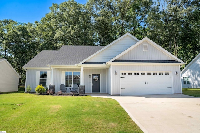 111 Caylee Way, Chesnee, SC 29323 - view of front of house featuring a garage, concrete driveway, a front lawn, and a porch