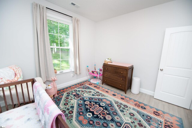 111 Caylee Way, Chesnee, SC 29323 - bedroom featuring multiple windows and wood finished floors