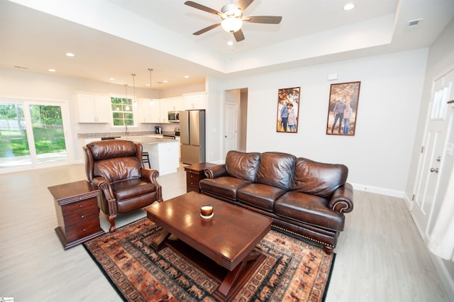 111 Caylee Way, Chesnee, SC 29323 - living room with a ceiling fan, light wood-style flooring, recessed lighting, and a tray ceiling