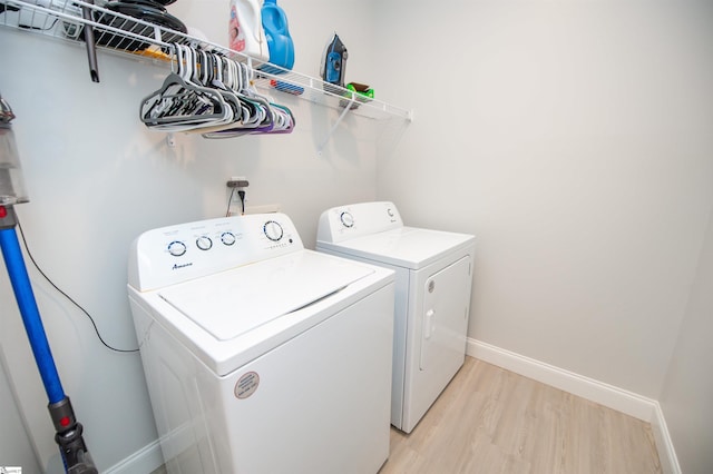 111 Caylee Way, Chesnee, SC 29323 - laundry area with washing machine and dryer and light wood finished floors