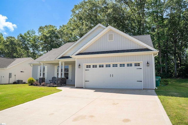 111 Caylee Way, Chesnee, SC 29323 - view of front of house featuring board and batten siding, a garage, a front yard, driveway, and roof with shingles