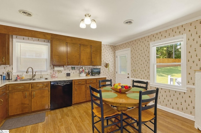 306 Verner Dr, Greenville, SC 29617 - kitchen featuring dishwasher, wallpapered walls, light wood-style flooring, brown cabinets, and crown molding