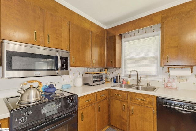 306 Verner Dr, Greenville, SC 29617 - kitchen featuring black appliances, light countertops, crown molding, and brown cabinetry